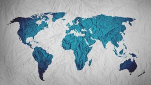 Illustration: flat map of the world on crinkled paper